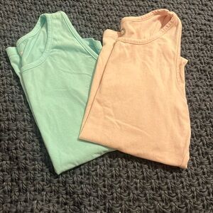 pink and blue tank tops in size 10/12
